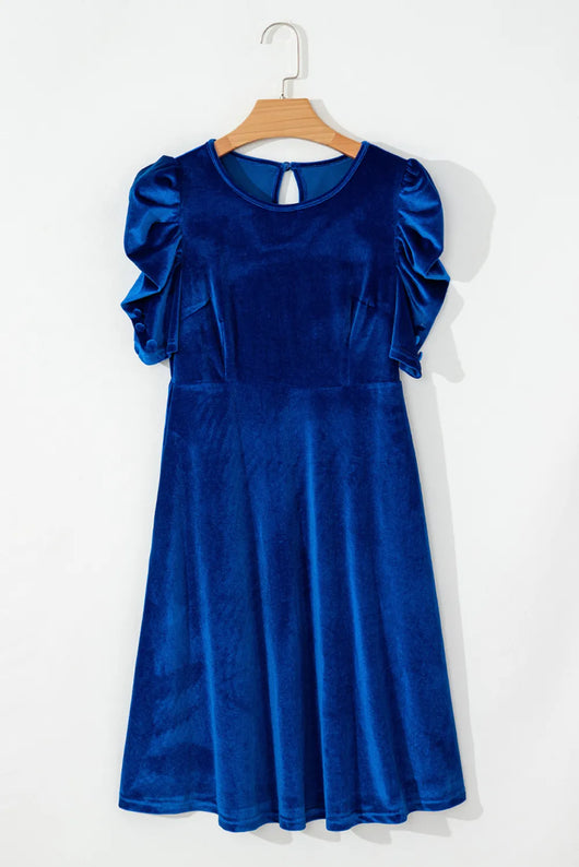 velvet puff sleeve dress on a hanger